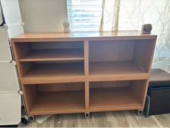 Wood grain Shelving unit with 4 Compartments and adjustable shelves.