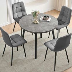 Circular 37” dining table with 4 chairs