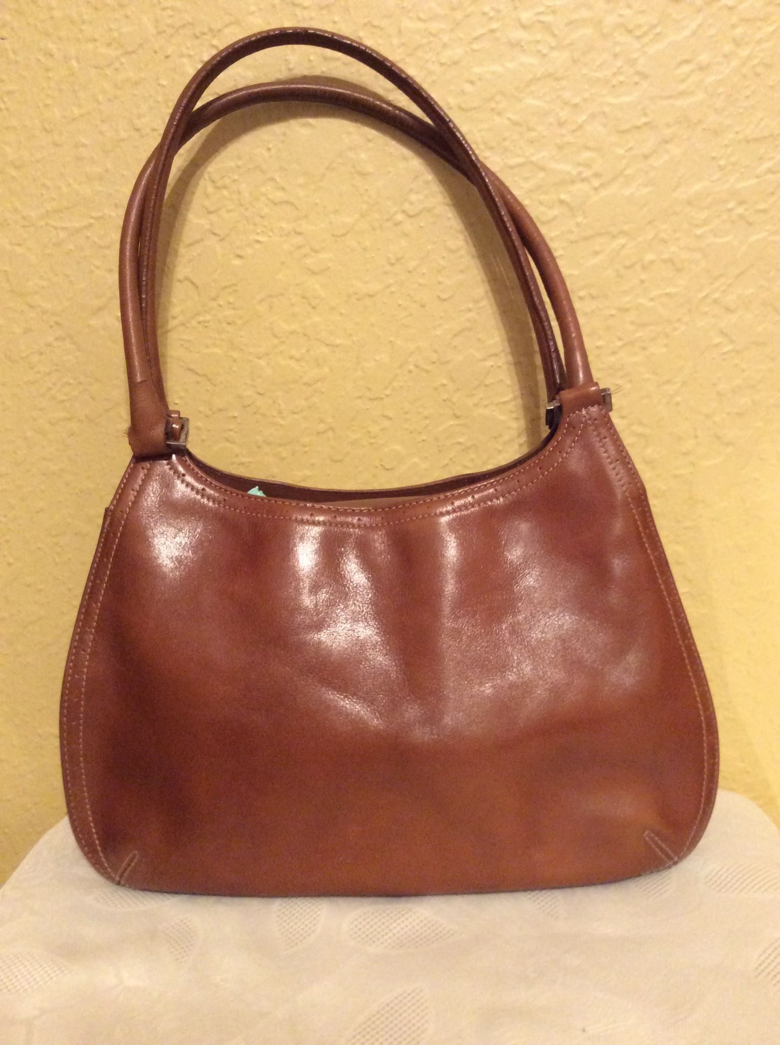 Anne Klein Womens Handbag. Inner zipper and pocket. Preowned. Review photos. Material is unknown. Color is brown.