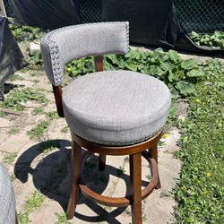 Two Swivel High Chairs