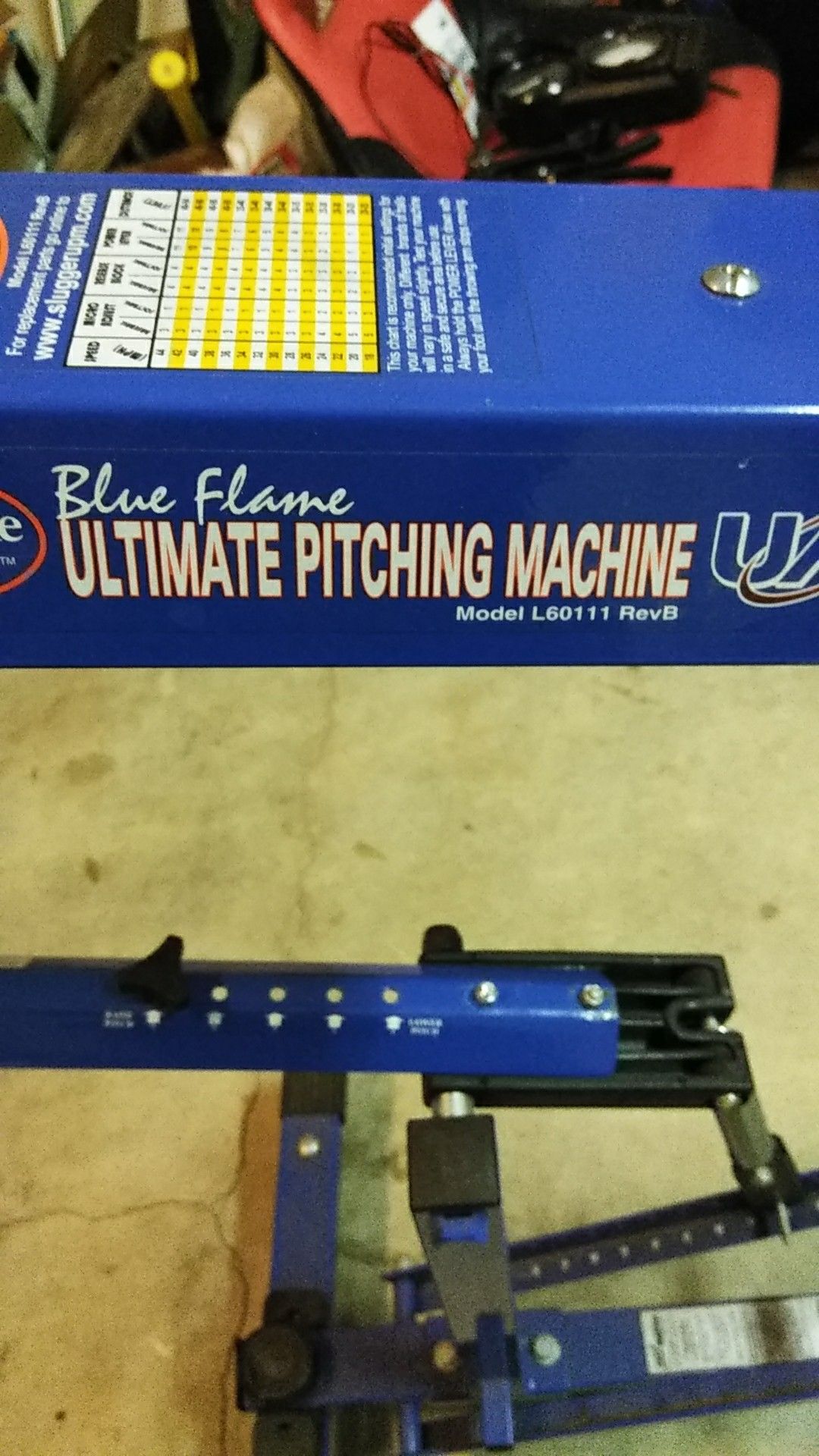 Louisville slugger blue flame ultimate pitching machine model L60111  Auction