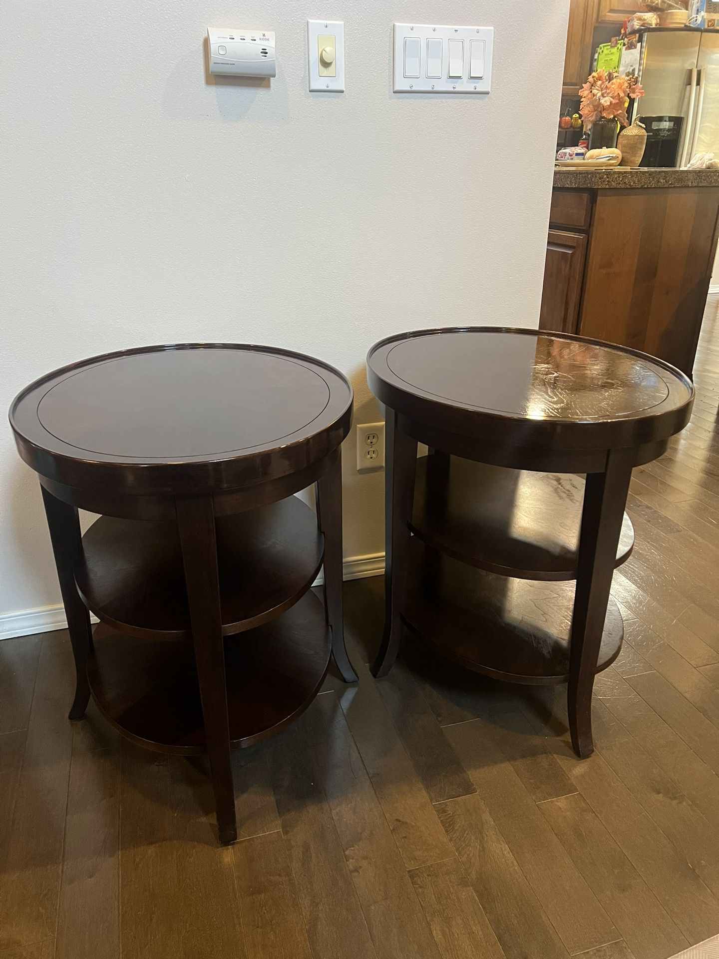 Oval mahogany end tables