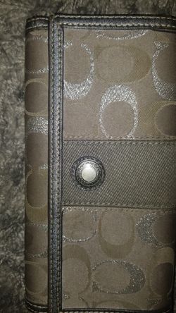 Coach grey and metallic wallet.