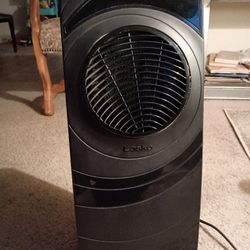 Black Lasko Swivel Tower Heater.