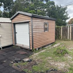 10×12 Storage Shed – Roll-Up Door – Great Condition