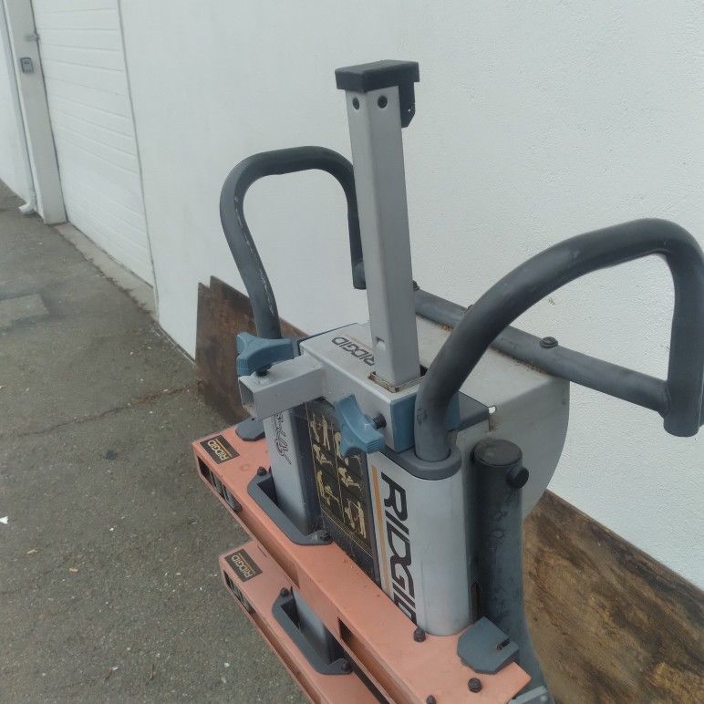 Ridgid classic heavy duty miter saw cart stand 2 wheels. Missing parts