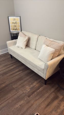 Beige sofa / coach