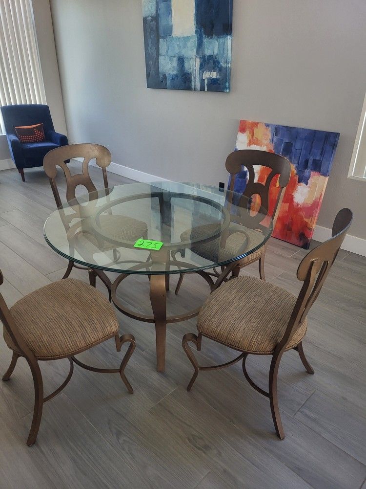 Table And 4 Chairs. 48"