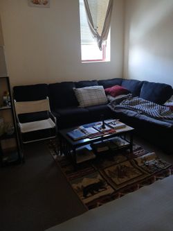 Black Sectional, New Condition.