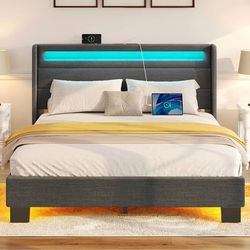 Brand new in box.  Heavy Full size bed frame with LED and charger station