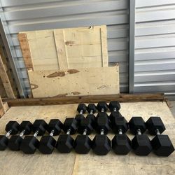 New pair of 20,25,30,45,50,55 and 60lb rubber dumbbells NEW IN BOX $570