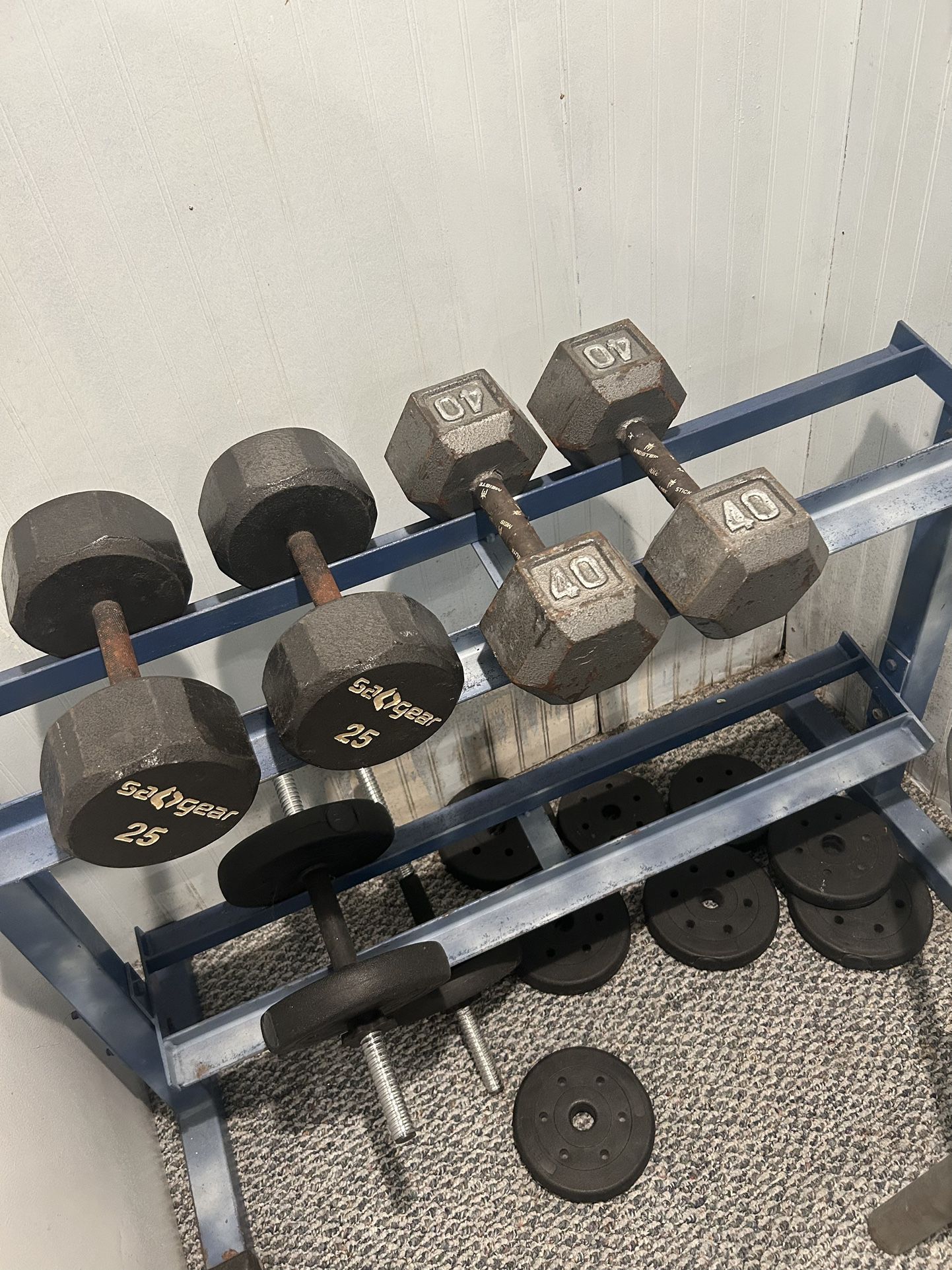 Weight rack, one set of 25 lb dumb bells, one set of 40 lb dumb bells & misc weights. $220 for everything. Pick up in southampton, pa