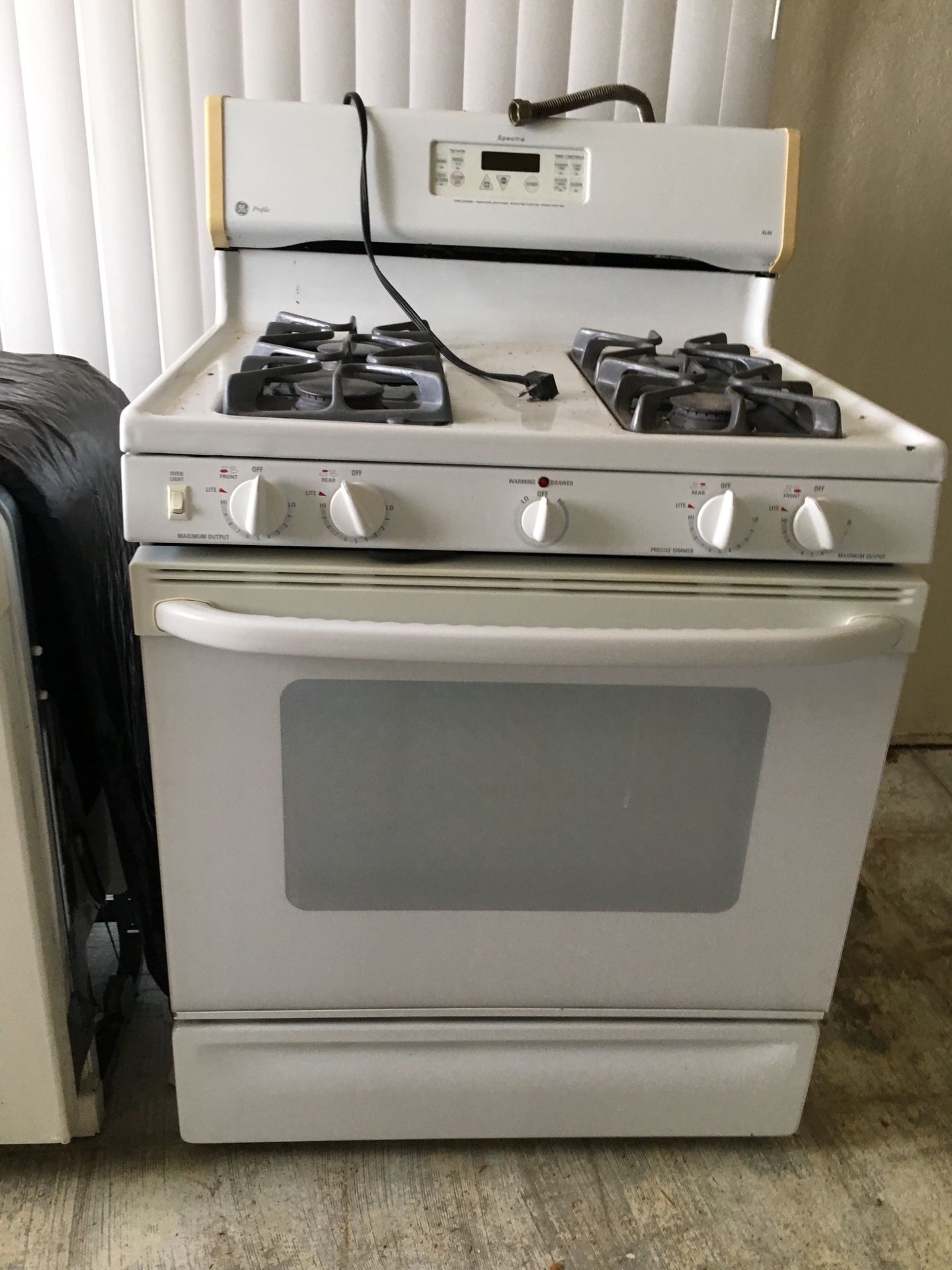GE triton XL dishwasher and also GE Profile spectra gas stove retails for $475 dishwasher 300+ very nice condition salad boat for 425 will post more