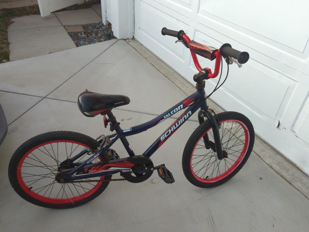 20" Schwinn Falcon Red Bike with  Small Tear  On Seat