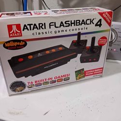 ATARI FLASHBACK 4  Classic game controller.   Good Condition.   76 built in games.  includes 2 wireless controllers.  Never used.