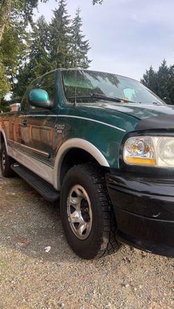 1998 Ford F-250 Triton Green & 1997 Ford F-250 Blue