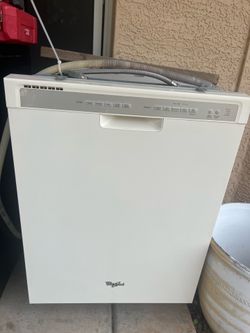 Whirlpool beige dishwasher