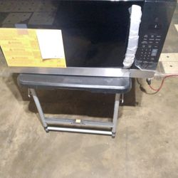 LG 1.3 cu. ft. 30 in. W Low Profile Over the Range Microwave Oven with EasyClean