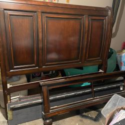 Brown wooden bed