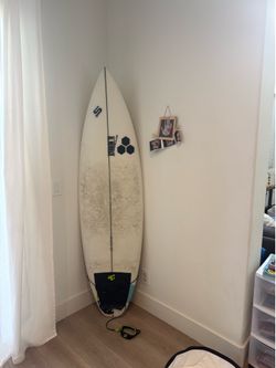 Al Merrick surf board (happy)