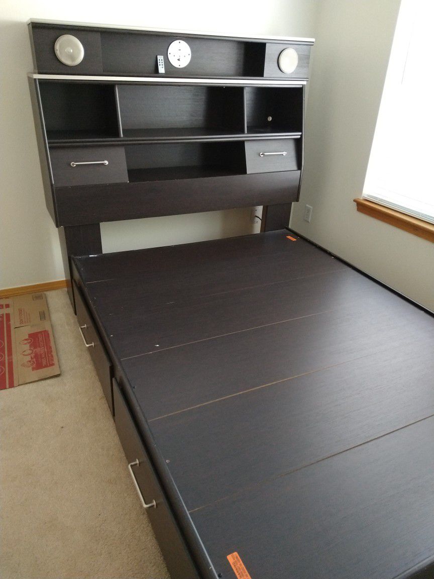 Ashley Furniture Full Storage Bed and Dresser/Mirror.