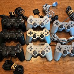 REAL Sony PS2 controllers with dual analog sticks playstation Genuine controllers in good condition.