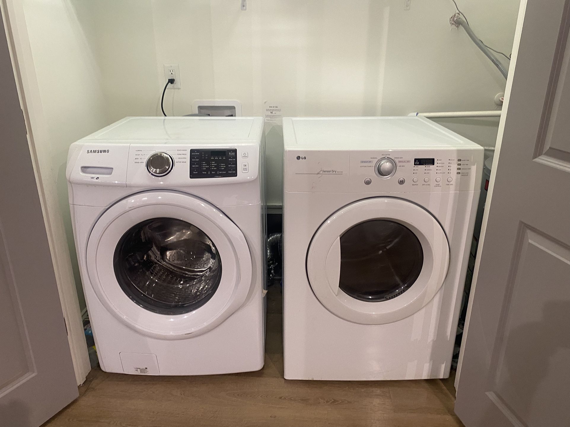 Samsung front-load washer + LG front-load electric dryer Set.