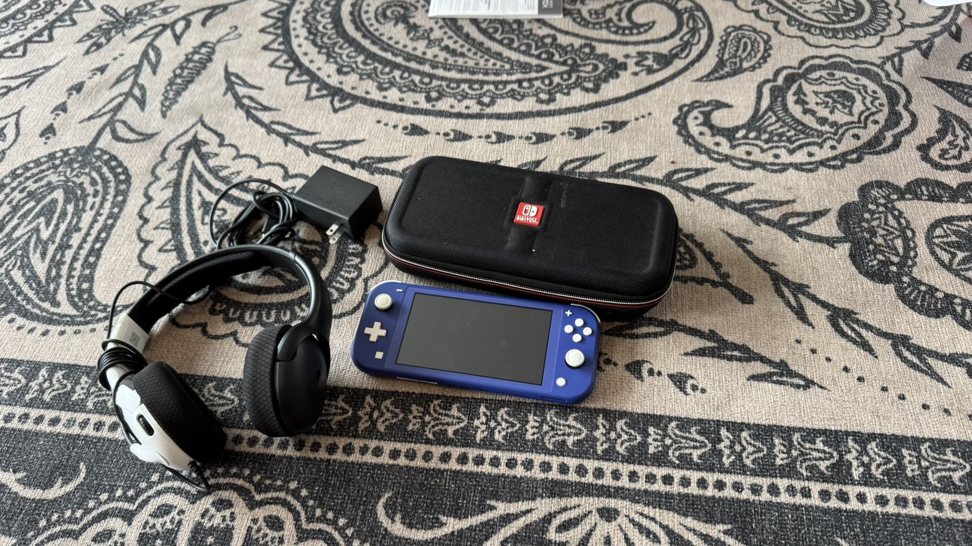 Switch lite (blue) With Case, Charger, 32gb Sd Card, And Headset