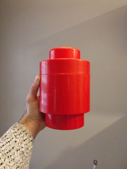 Red Lego single storage brick