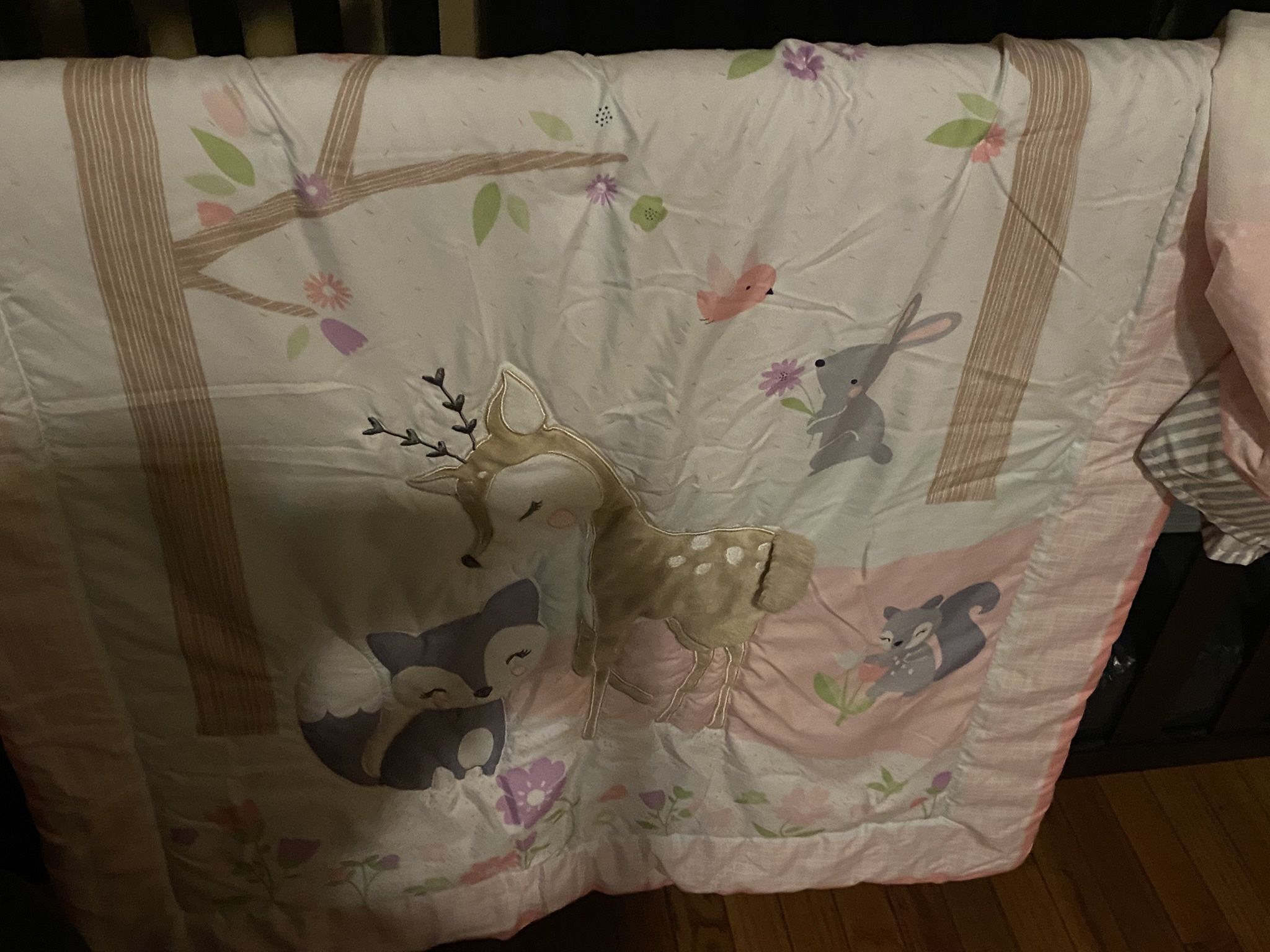  Baby bed, comforter sheets, mobile, and skirt