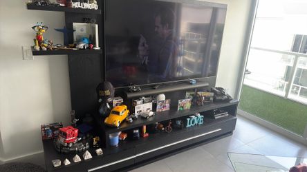 Entertainment center with tv and surround