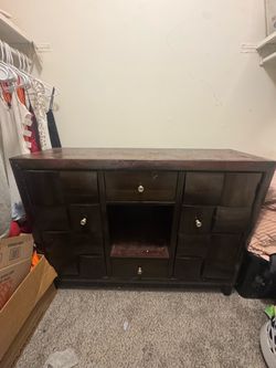 Dark Wood Dresser with Multiple Drawers