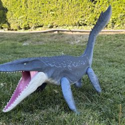 “Large Mosasaurus toy” or “Jurassic sea dinosaur figure”
