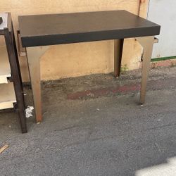 Table With Metal Legs And Hanging Bars