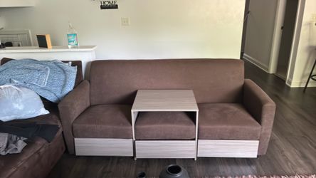 Couch with storage draws bundled with center table