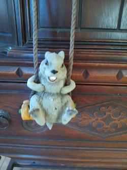 Adorable Grey Bunny on a Carrot Swing. Total Length 20" Such a Fun Garden Decor. Polyresin