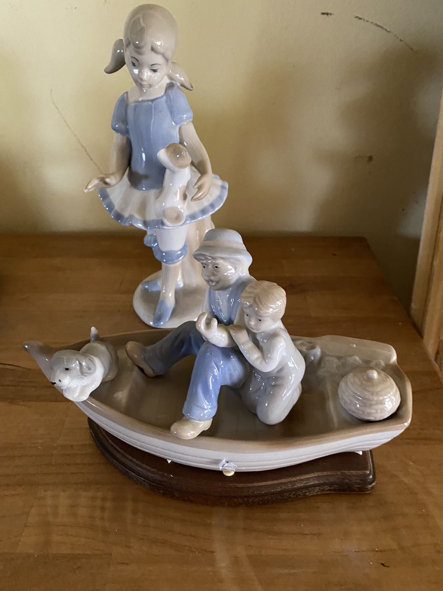 Two Boys On A Boat Figurine