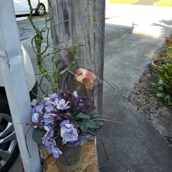 Spring Flower Arrangement With a Bird