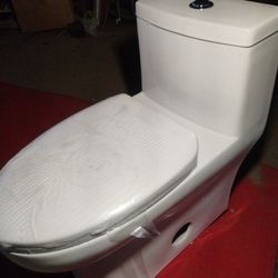 
1-piece 0.8 GPF/1.28 GPF High Efficiency Dual Flush Elongated Toilet in. White Soft-Close Seat Included ADA Height