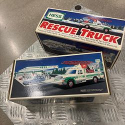 1994 Hess Rescue Truck- 2 collectible toy trucks released annually by Hess Corporation as part of a holiday tradition.. brand new in the original box 