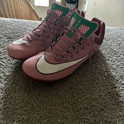 Nike pink track spikes