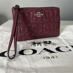 Coach Embossed Wristlet 
