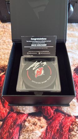 NICO HISCHIER AUTOGRAPHED PUCK