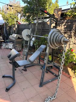 OLYMPIC SQUAT RACK WITH OLYMPIC WEIGHTS AND BENCH