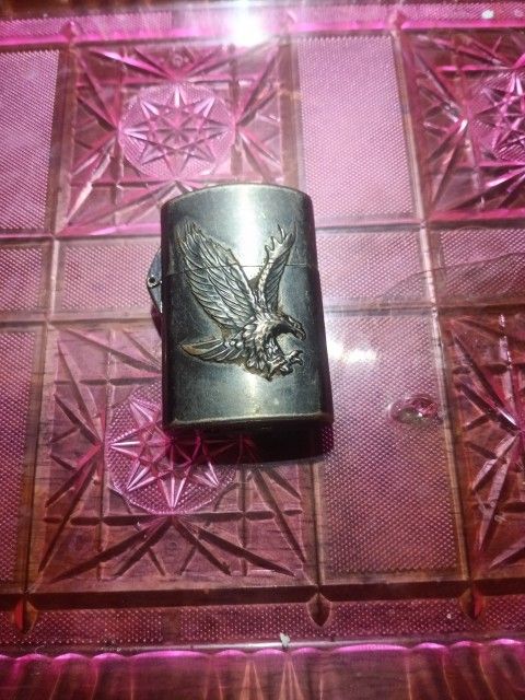 Vintage Silver Toned Zippo Lighter With An 🦅 Eagle Design For Sale.