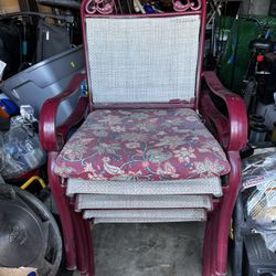 Four Red Metal Chairs With Cushions