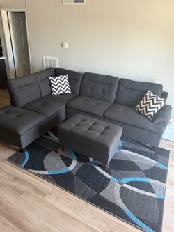Dark Grey ‘L Shape’ Couch With Ottoman