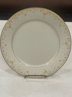 Porcelain dinner plate in the Fragrance pattern by Noritake. Made in Japan. 10.5”