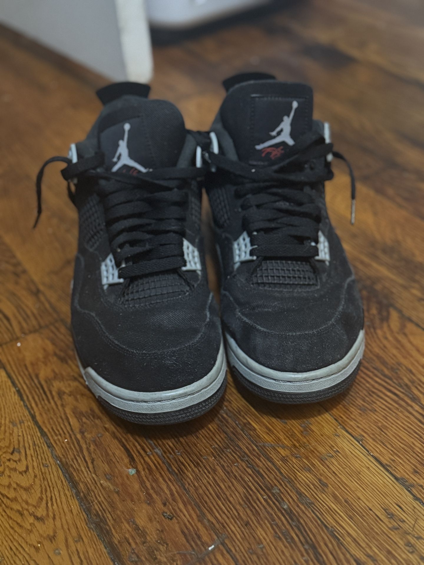 Black Canvas Jordan 4s