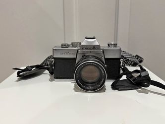 Minolta 35mm film camera with 55mm lens
